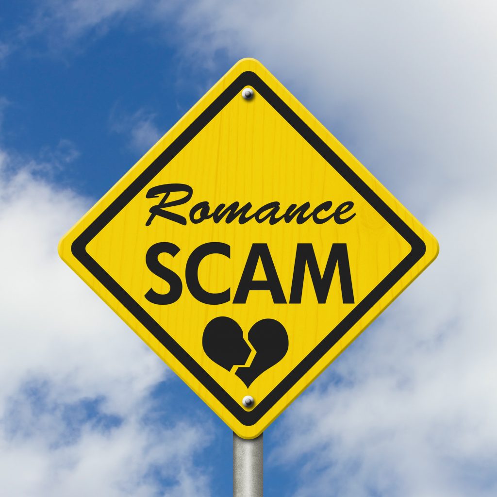 Gelbes Warnschild welches vor Romance-Scammern warnt